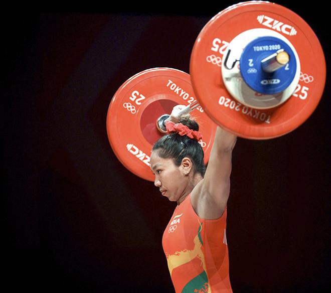  Mirabai Chanu of Team India competes during the Weightlifting - Women’s 49kg Group A on day one of the Tokyo 2020 Olympic Games at Tokyo International Forum on July 24, 2021 in Tokyo, Japan.